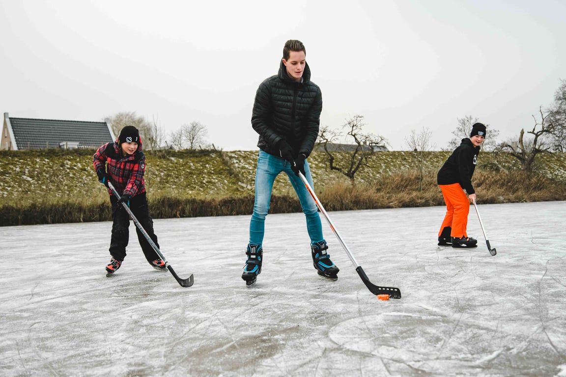 IJshockeypuck in Blister • Oranje •